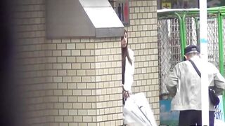 Close-up of Japanese women urinating in a public restroom