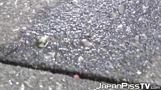 Sexy Japanese girl urinates near a cyclist