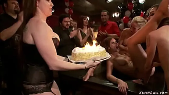 MILF Syren de Mer and Simone Sonay are presented as hot slaves at Princess Donna Dolore birthday orgy party and they are public fucked and fisted
